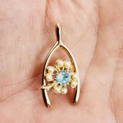 VINTAGE GOLD TONED BLUE CRYSTAL WISH BONE PIN