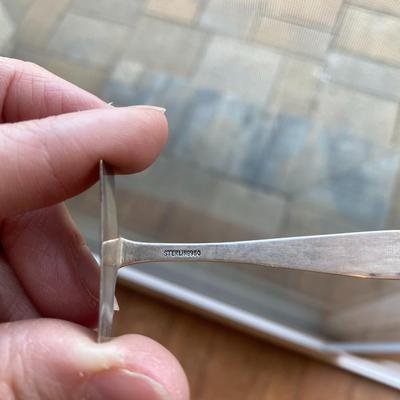 1 - Sterling silver baby food pusher and 1 Sterling baby spoon engraved with "Susan" 