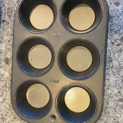 Assorted Baking Items; 2 Loaf Pans; 3 Muffin Pans: 1 (7") stainless steel fluted brioche pan; 3 Wire Cooling racks