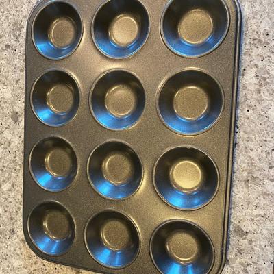 Assorted Baking Items; 2 Loaf Pans; 3 Muffin Pans: 1 (7") stainless steel fluted brioche pan; 3 Wire Cooling racks