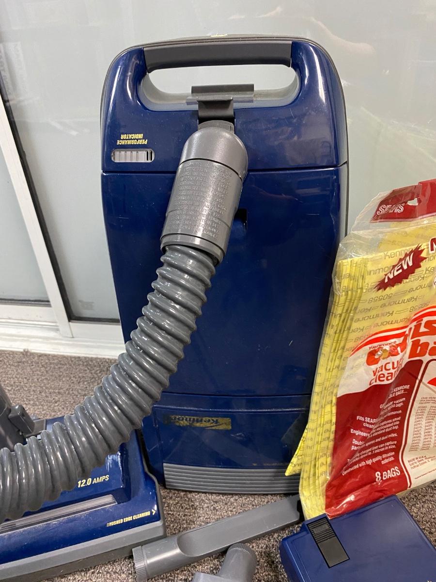 Kenmore Power-Mate 12amp Canister Vacuum with Attachments and Extra Bags |  EstateSales.org