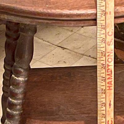 Round top spool leg table