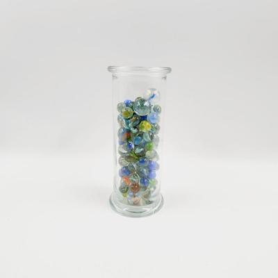 GLASS FULL OF MARBLES