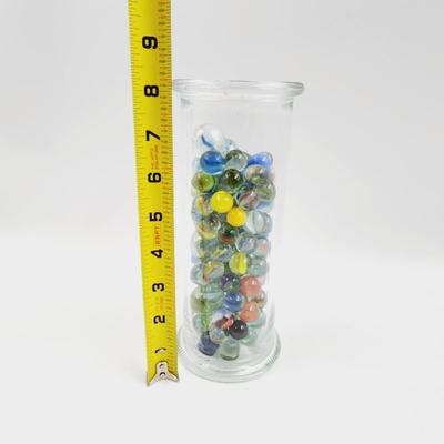 GLASS FULL OF MARBLES