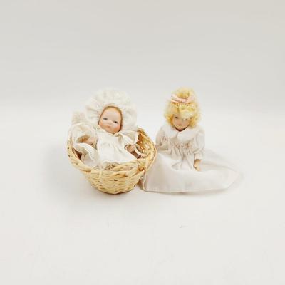2 SMALL VINTAGE PORCELAIN DOLLS W/ BASKET