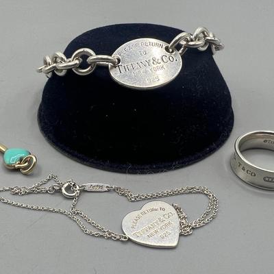 Lot of Tiffany & Co. Sterling Silver Bracelet, Necklace, Ring, & Charms