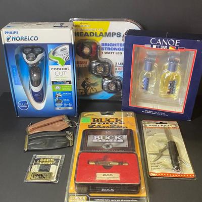 LOT 31: New in Package: Cologne, Norelco Shaver, Buck Knife & More