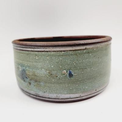 TEAL & BROWN STAMPED POTTERY BOWL