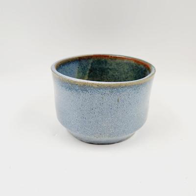 MULTI TONED BLUE SIGNED POTTERY BOWL
