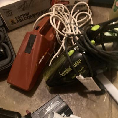 Lot of vacuum cleaners and other tools
