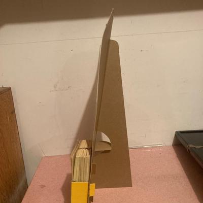 1975 cardboard signage with 70’s  shelf liner.