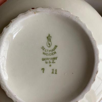 Bowls, platters, plates, bells, dishes with lids and ink well.  From Germany, Italy, Japan, Austria