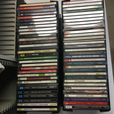 627 Lot of Fellowes CD Storage with Assorted Music CD's