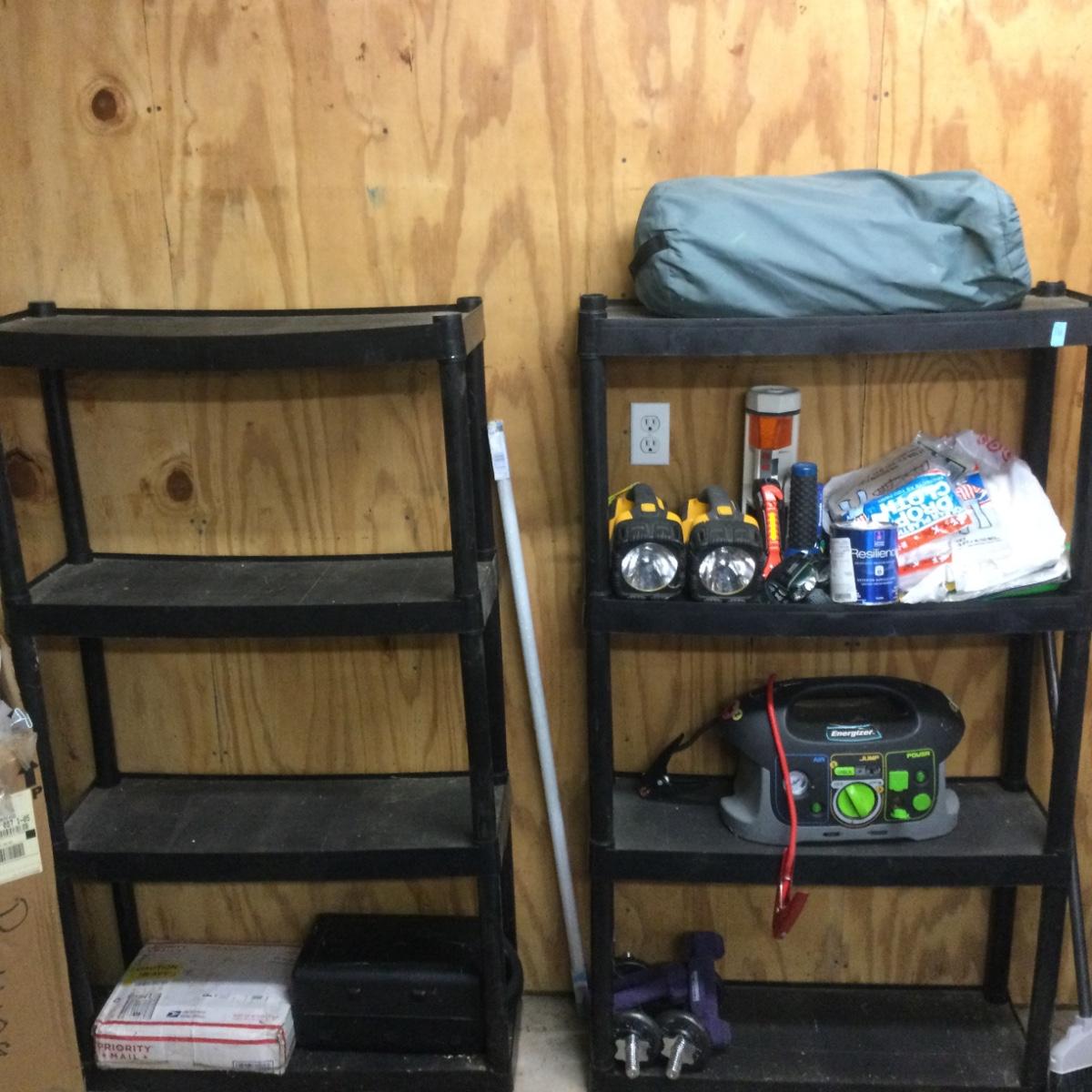 699 Two Small Black Plastic Shelving Units