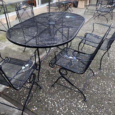Oval outdoor metal patio table