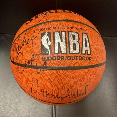 Jerry West and Michael Cooper signed basketball