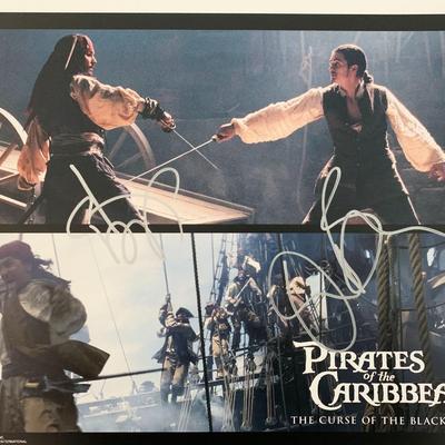 Pirates of the Caribbean: The Curse of the Black Pearl Johnny Depp and Orlando Bloom signed lobby card