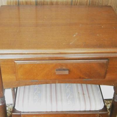 Singer Electric Sewing Machine in wood cabinet