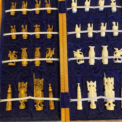 Hand carved wood box and chess pieces
