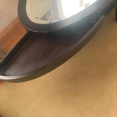 Mirrored oval coffee table