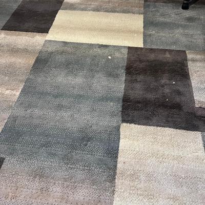 Low pile area rug