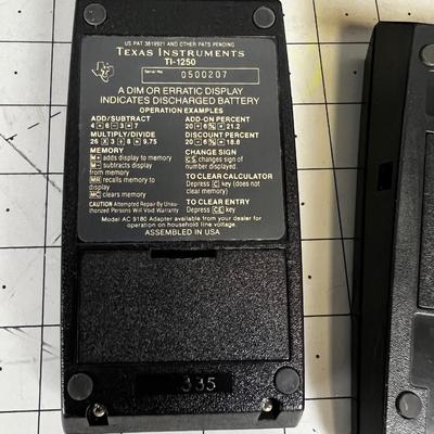 2 Vintage Texas Instrument TI Calculators with charges 