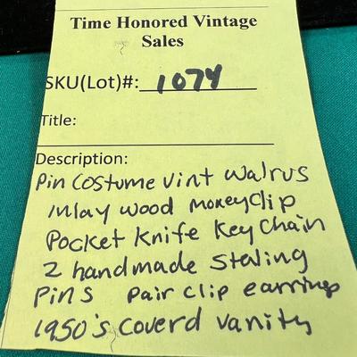 Vintage collectibles lot with a walrus