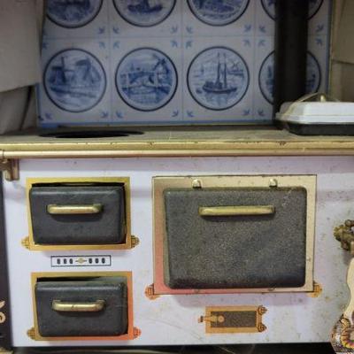 Antique tin child's stove in original box