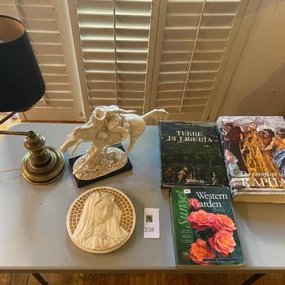 A. Santini western sculpture, the virgin mary wall hanging and more