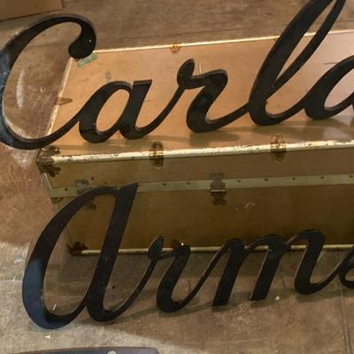 Building signs and vintage trunk