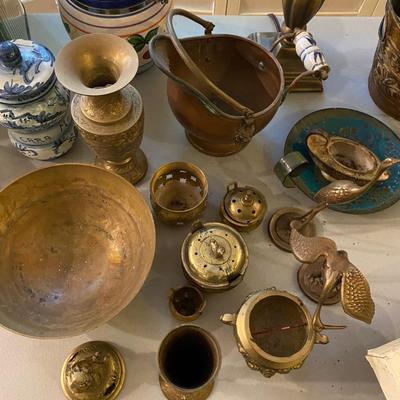 Collection of incense burners, brass bowls, table lamp, tins and more.