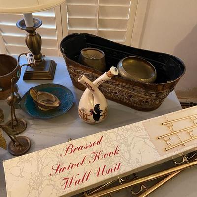 Collection of incense burners, brass bowls, table lamp, tins and more.