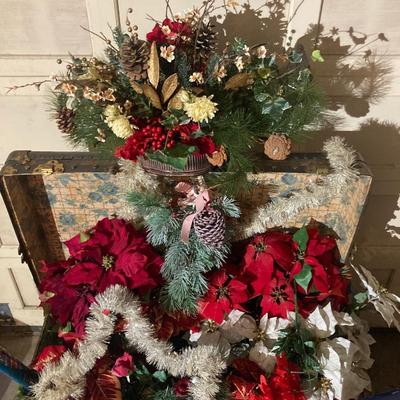 Steamer trunk with faux holiday flowers