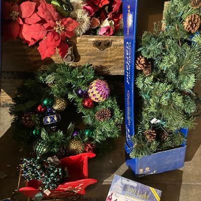 Steamer trunk with faux holiday flowers