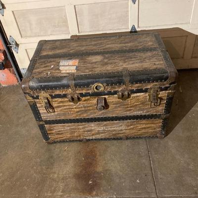 Steamer trunk with faux holiday flowers