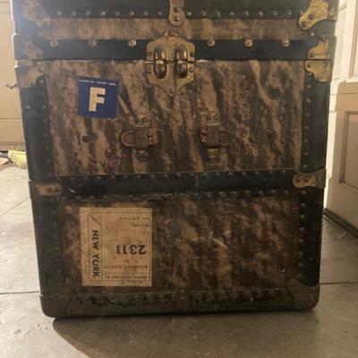 Steamer trunk with faux holiday flowers