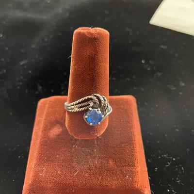 TWISTED STERLING RING WITH BLUE STONE