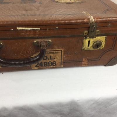 829 Antique Suitcase with Travel Stickers