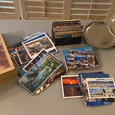 Large collection of old Travel postcards with stamps and  coins