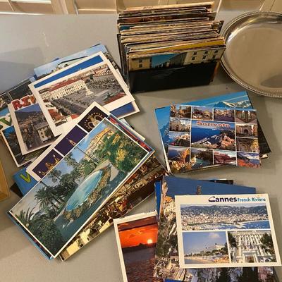 Large collection of old Travel postcards with stamps and  coins