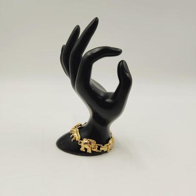 GOLD TONED ZOO ANIMAL CLASP BRACELET