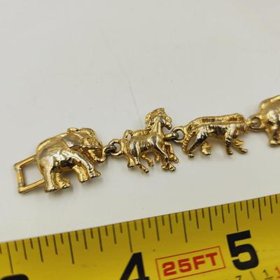 GOLD TONED ZOO ANIMAL CLASP BRACELET