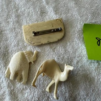 Ivory pendants & brooch