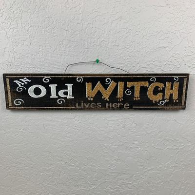 #93 An Old Witch Lives Here Wooden Wall Sign 24" x 5"
