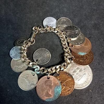 FOREIGN COIN CHARM BRACELET AND EARRINGS