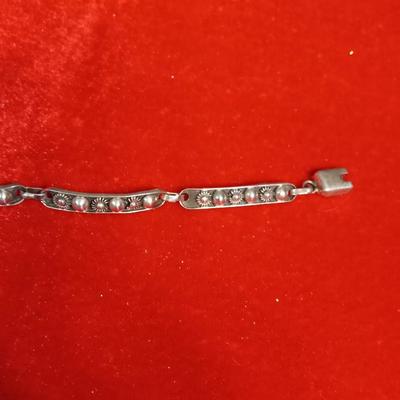 STERLING SILVER BRACELET AND LAPEL PIN