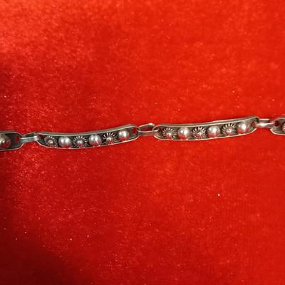 STERLING SILVER BRACELET AND LAPEL PIN