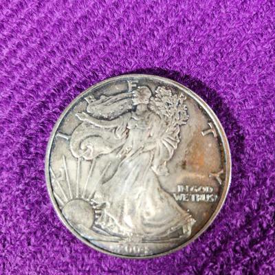 Two One Dollar Silver Eagles