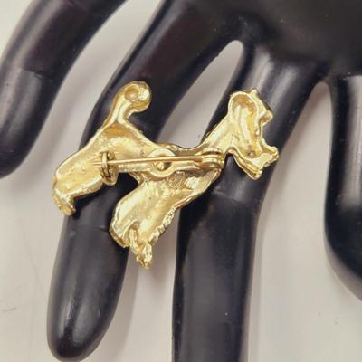VINTAGE GOLD TONED POODLE PIN W/ RED JEWELED EYE
