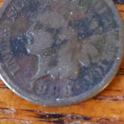 LOT 107  FOUR OLD INDIAN HEAD PENNIES